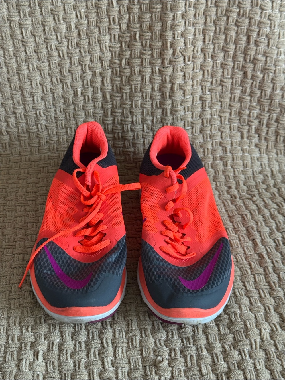 Nike Women's Neon Orange Running Sneakers with Purple Swoosh